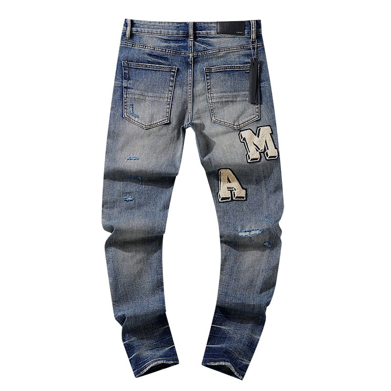 Amiri Varsity Letter Patch Distressed Jeans